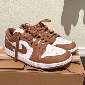 Brown and White leather Jordan’s